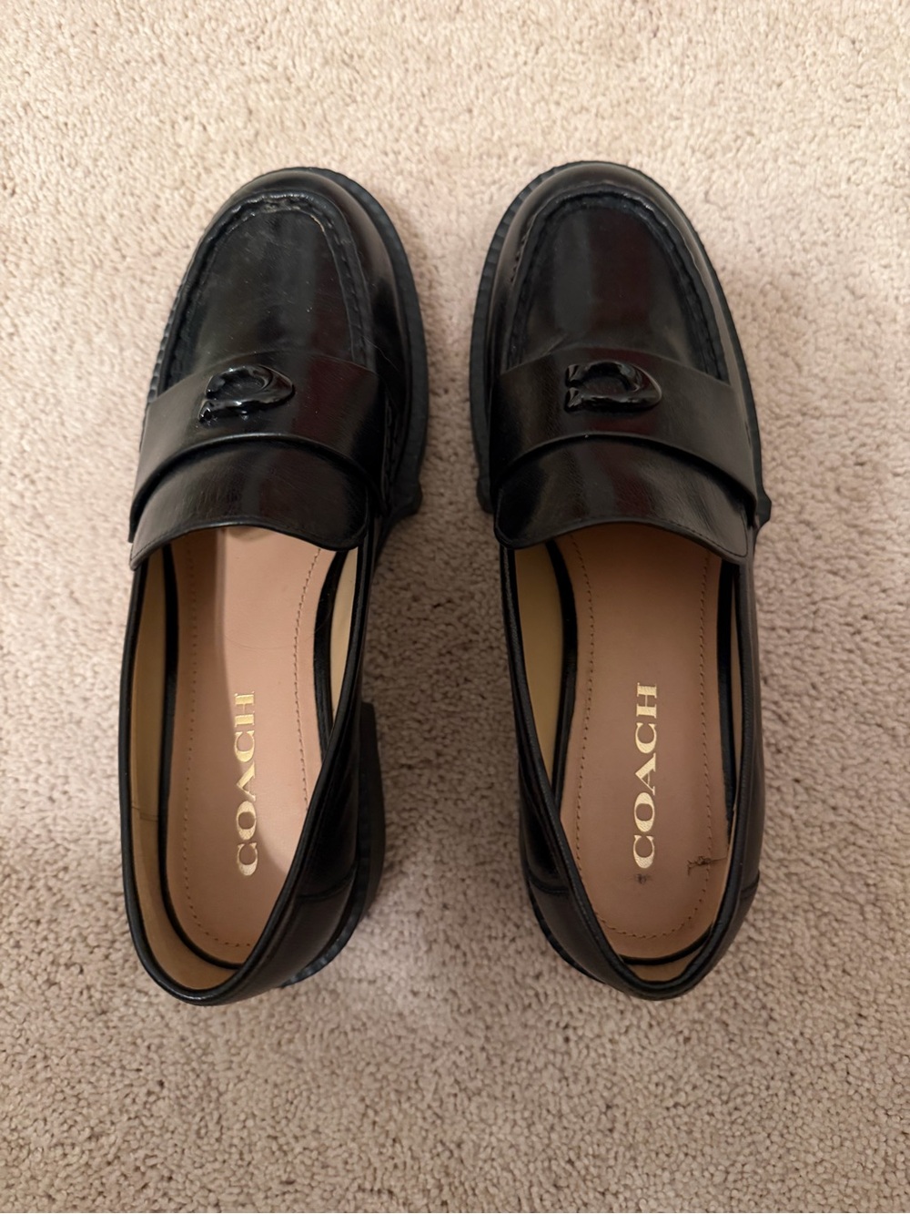COACH Women’s Black Leather Lug Sole Loafers with Signature C Hardware. New